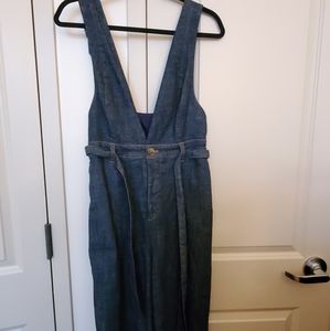 Denim overalls.